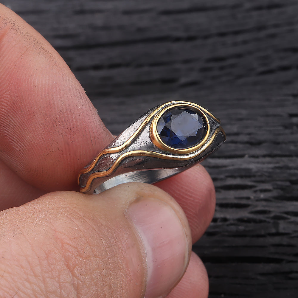 Menโs Silver Ring with Gold Accents and Midnight Blue Stone